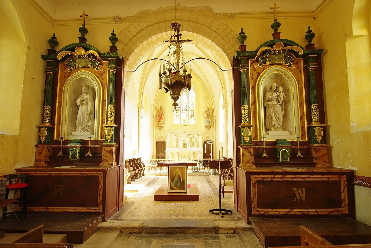 Les 2 retables polychromie du XVIIIè siècle, restaurés en 1995, dans l'église de Mutrécy, Calvados.